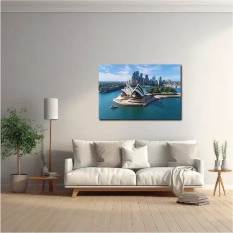 Interior moderno con sofá, planta y una pintura del Sydney Opera House.